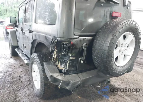 2015 Jeep Wrangler Unlimited Sport из США, поврежденный, VIN 1C4HJWDG5FL670693